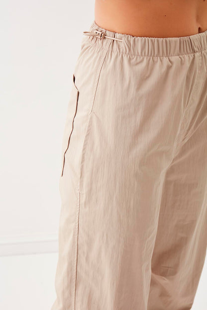 RUBBER-DETAILED PARACHUTE FABRIC TROUSERS