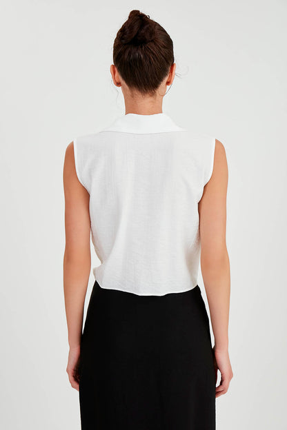 SLEEVELESS BLOUSE