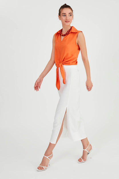 SLEEVELESS BLOUSE