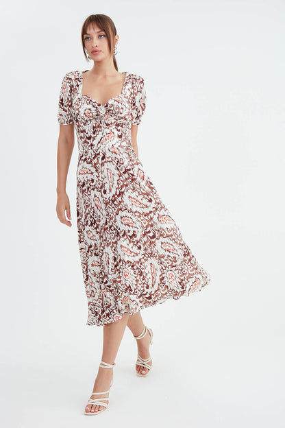 DRESS WITH CURVED FRONT