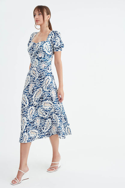 DRESS WITH CURVED FRONT