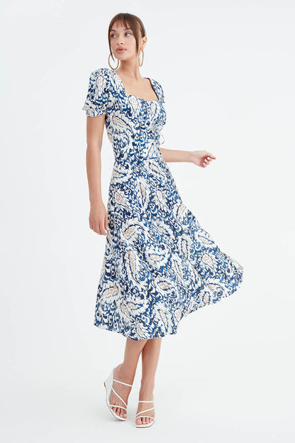 DRESS WITH CURVED FRONT
