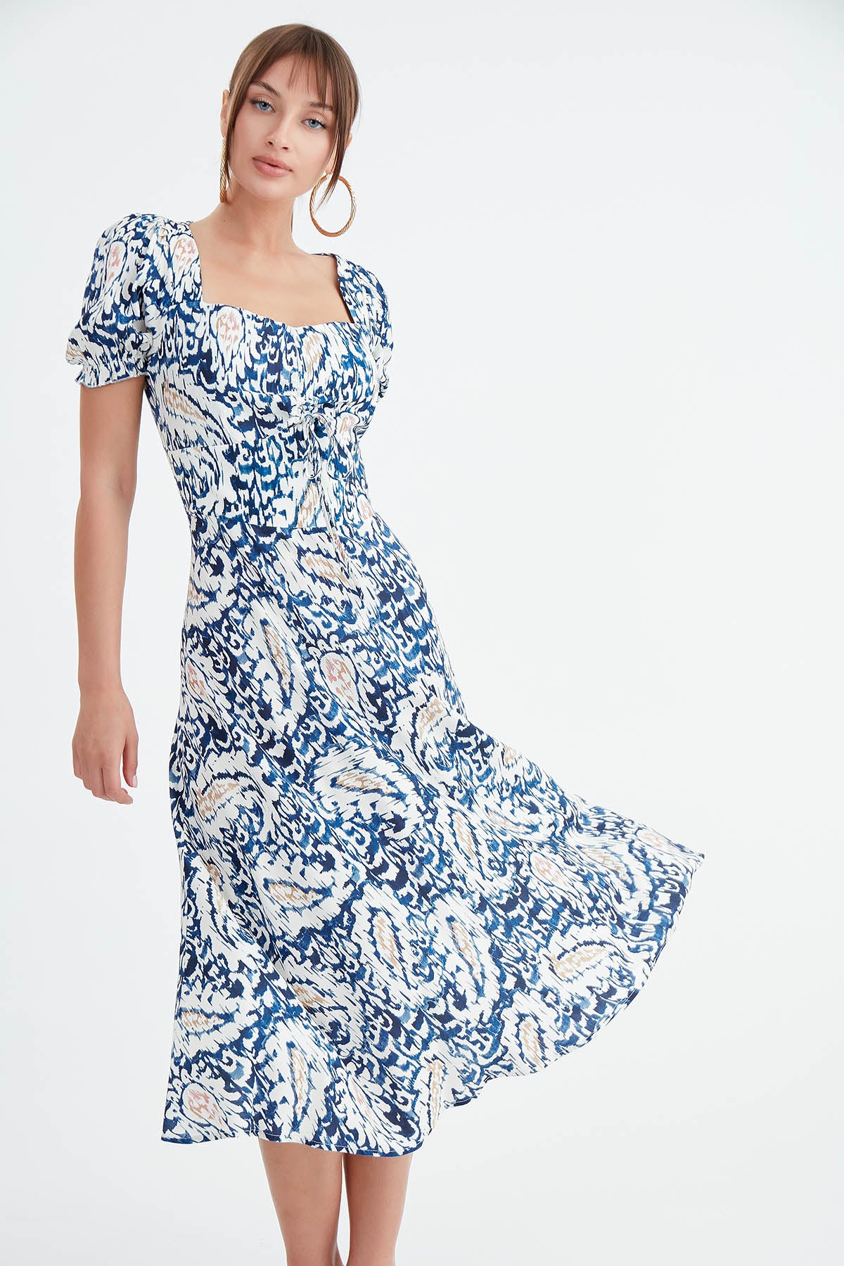 DRESS WITH CURVED FRONT