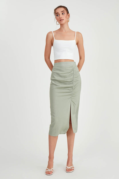 MIDI HEIGHT SKIRT WITH BENT-UP SPLIT