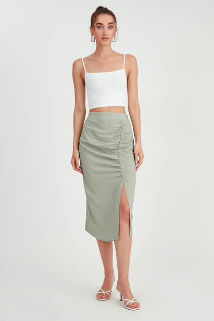 MIDI HEIGHT SKIRT WITH BENT-UP SPLIT