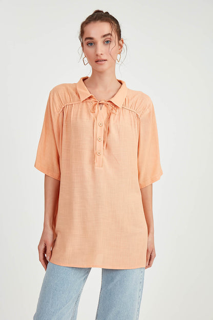 BLOUSE WITH NECK BUTTON BINDING