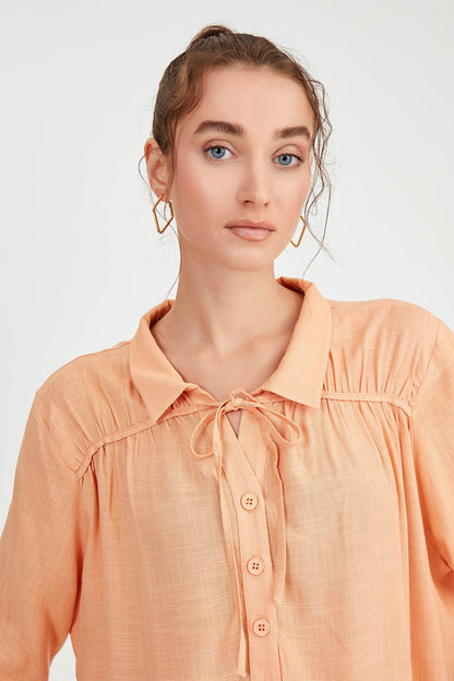 BLOUSE WITH NECK BUTTON BINDING