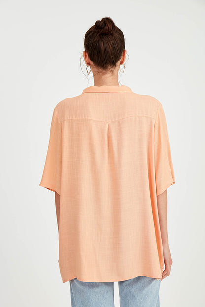 BLOUSE WITH NECK BUTTON BINDING