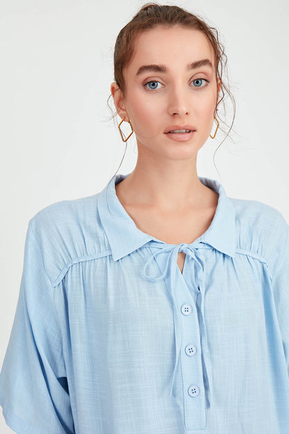 BLOUSE WITH NECK BUTTON BINDING