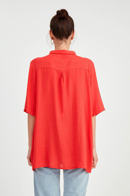 BLOUSE WITH NECK BUTTON BINDING