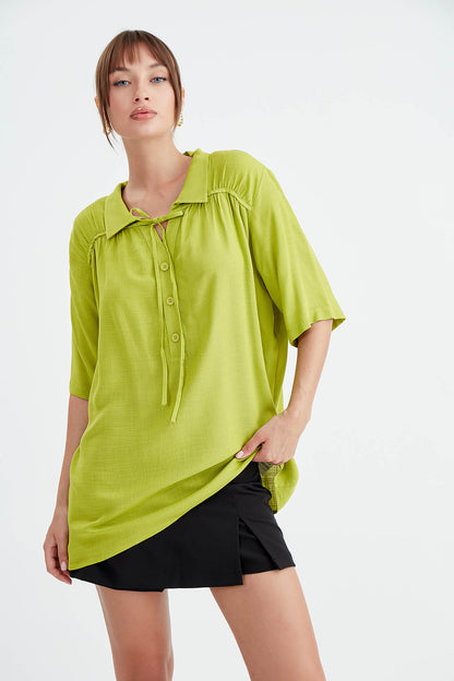BLOUSE WITH NECK BUTTON BINDING