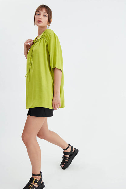 BLOUSE WITH NECK BUTTON BINDING