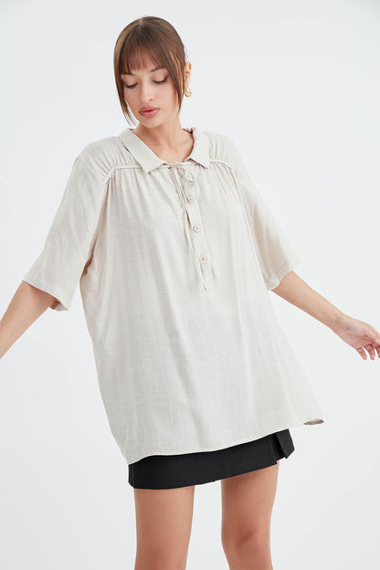 BLOUSE WITH NECK BUTTON BINDING