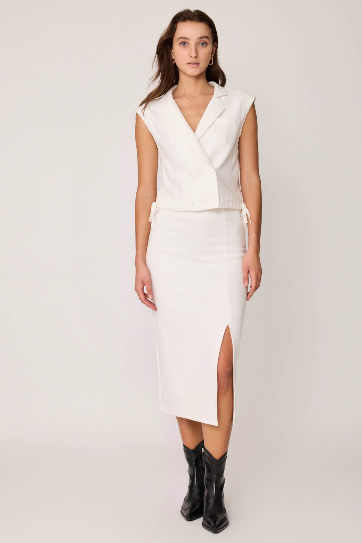 KNITTED VEST WITH WEDGE BUTTONS
