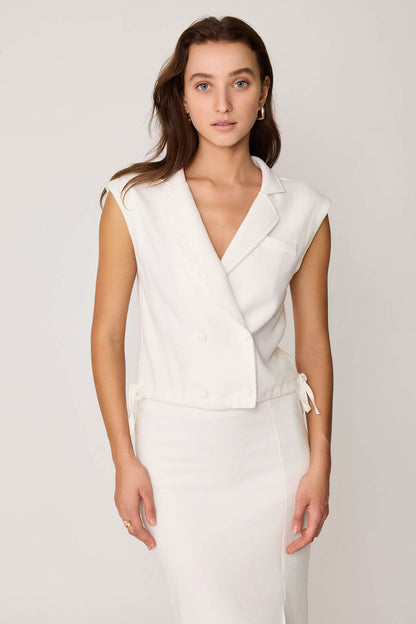 KNITTED VEST WITH WEDGE BUTTONS