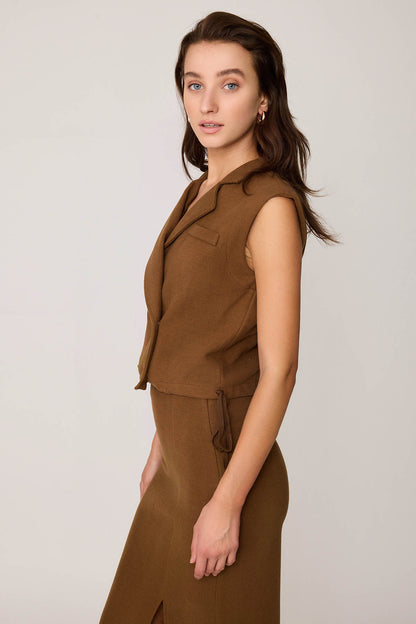 KNITTED VEST WITH WEDGE BUTTONS