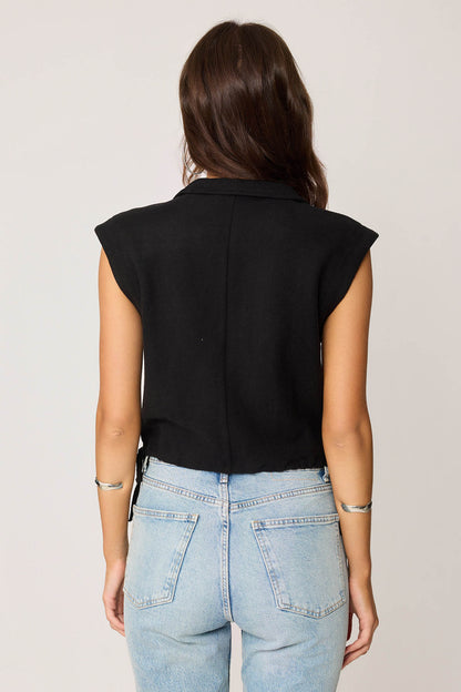 KNITTED VEST WITH WEDGE BUTTONS