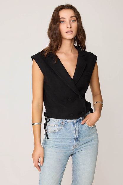 KNITTED VEST WITH WEDGE BUTTONS