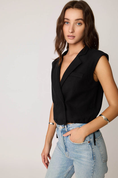 KNITTED VEST WITH WEDGE BUTTONS