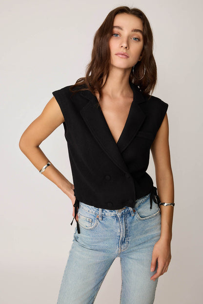 KNITTED VEST WITH WEDGE BUTTONS