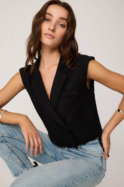 KNITTED VEST WITH WEDGE BUTTONS