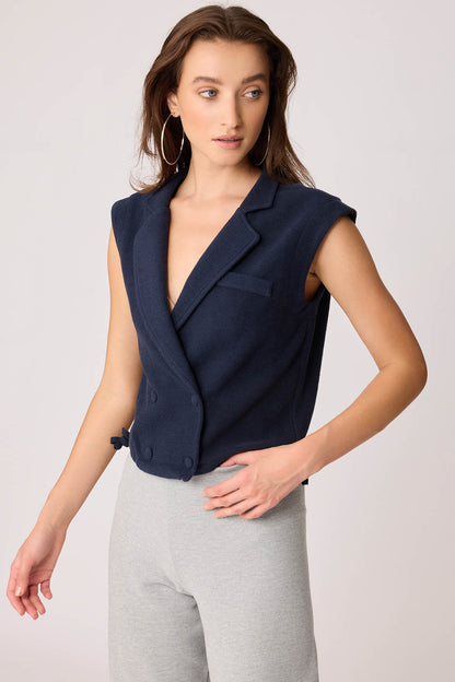 KNITTED VEST WITH WEDGE BUTTONS