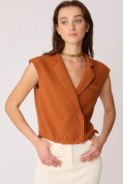 KNITTED VEST WITH WEDGE BUTTONS