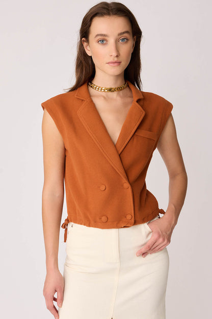 KNITTED VEST WITH WEDGE BUTTONS