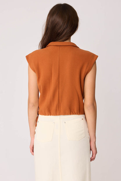 KNITTED VEST WITH WEDGE BUTTONS