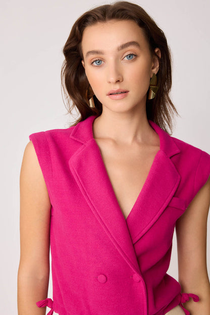 KNITTED VEST WITH WEDGE BUTTONS