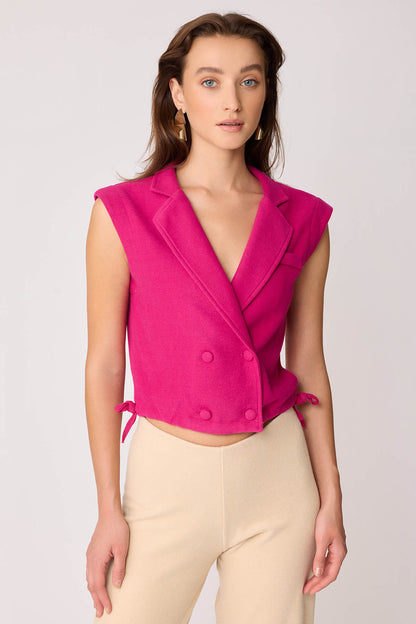 KNITTED VEST WITH WEDGE BUTTONS