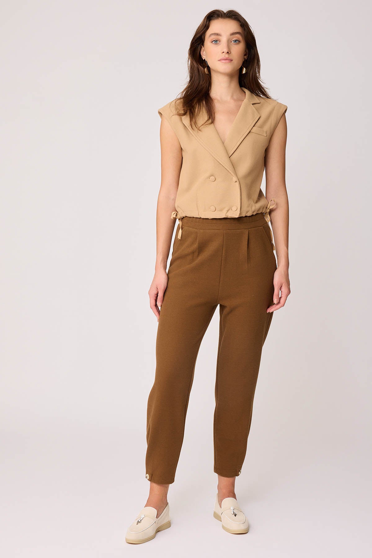 KNITTED VEST WITH WEDGE BUTTONS