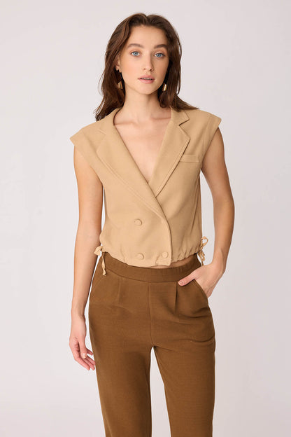 KNITTED VEST WITH WEDGE BUTTONS
