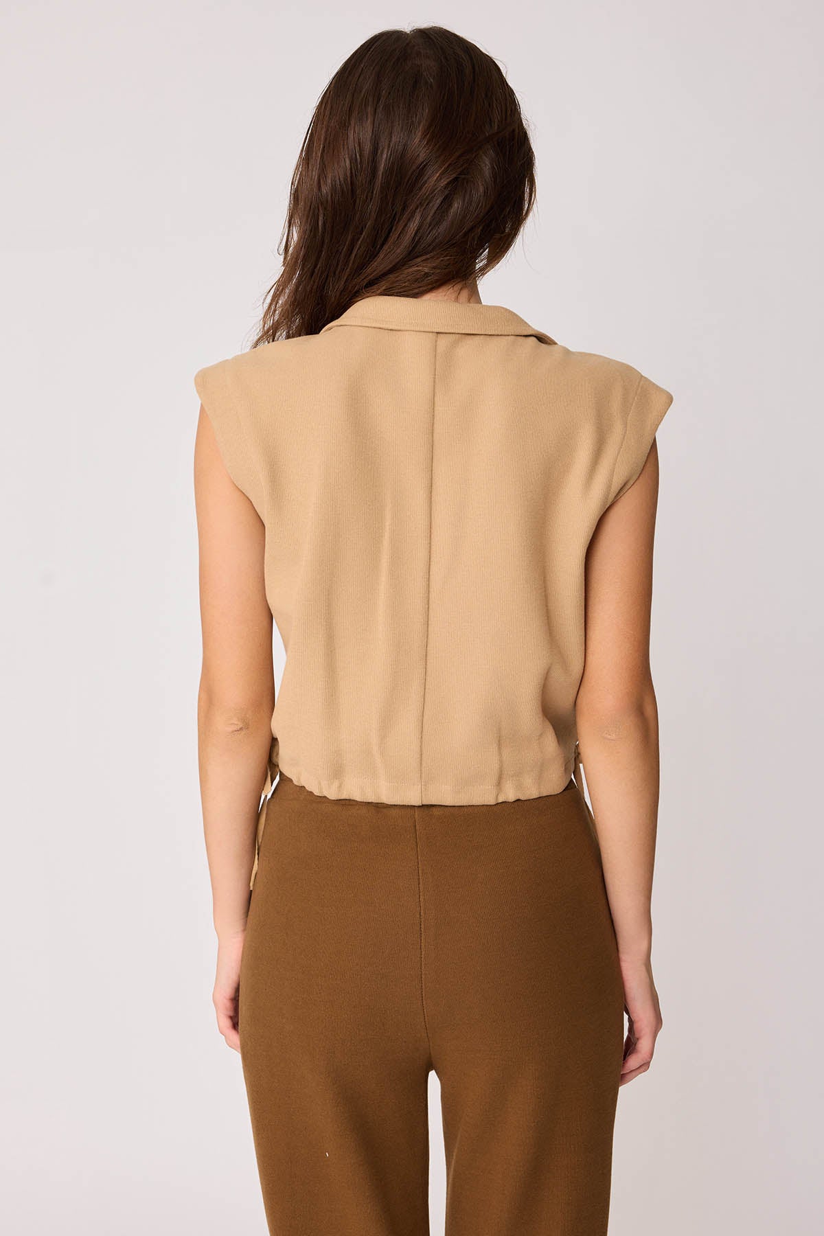 KNITTED VEST WITH WEDGE BUTTONS