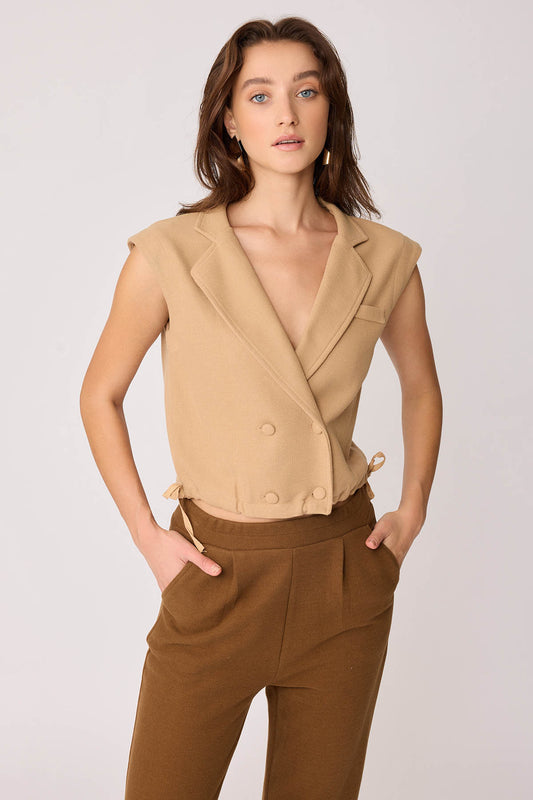KNITTED VEST WITH WEDGE BUTTONS