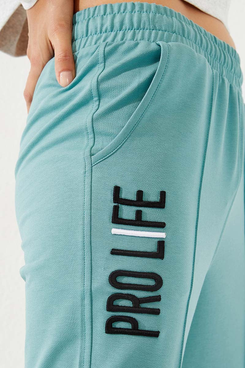 Mint Green Embroidered Comfort Fit Elastic Ankle Women's Tracksuit Bottom - 94571
