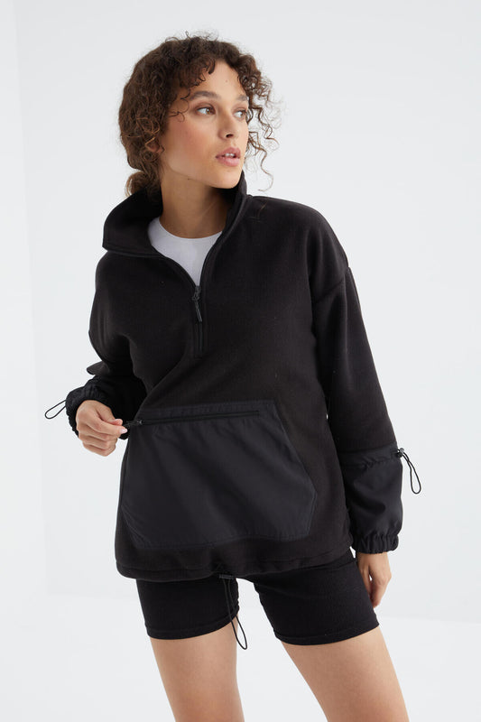 Oversize women's Polar Sweatshirt with a black skirt and a curly hem - 97238