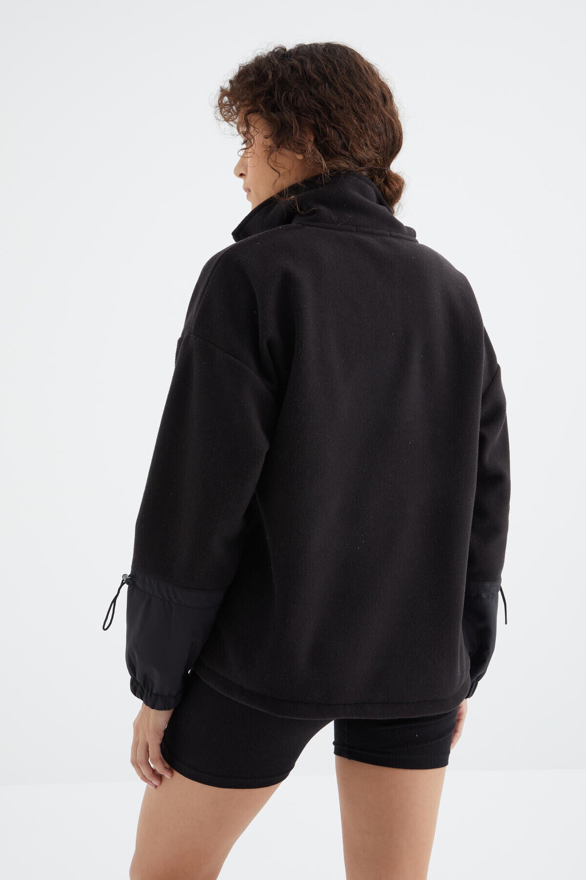 Oversize women's Polar Sweatshirt with a black skirt and a curly hem - 97238