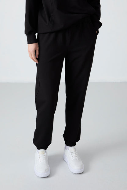 Black Hooded Kangaroo Pocket Oversize Elastic Cuff Women's Tracksuit Set - 95288