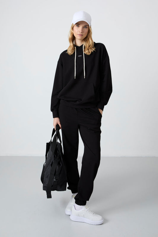 Black Hooded Kangaroo Pocket Oversize Elastic Cuff Women's Tracksuit Set - 95288
