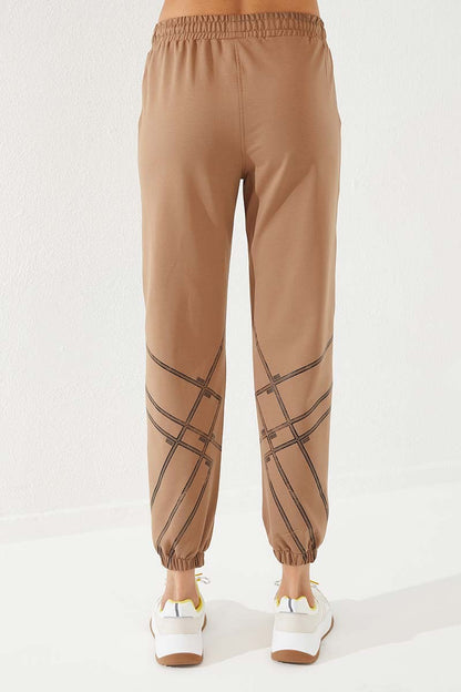 Women's Relaxed Fit Ribbed Cuff Tracksuit Bottom with Earth Tone Line Print - 94585