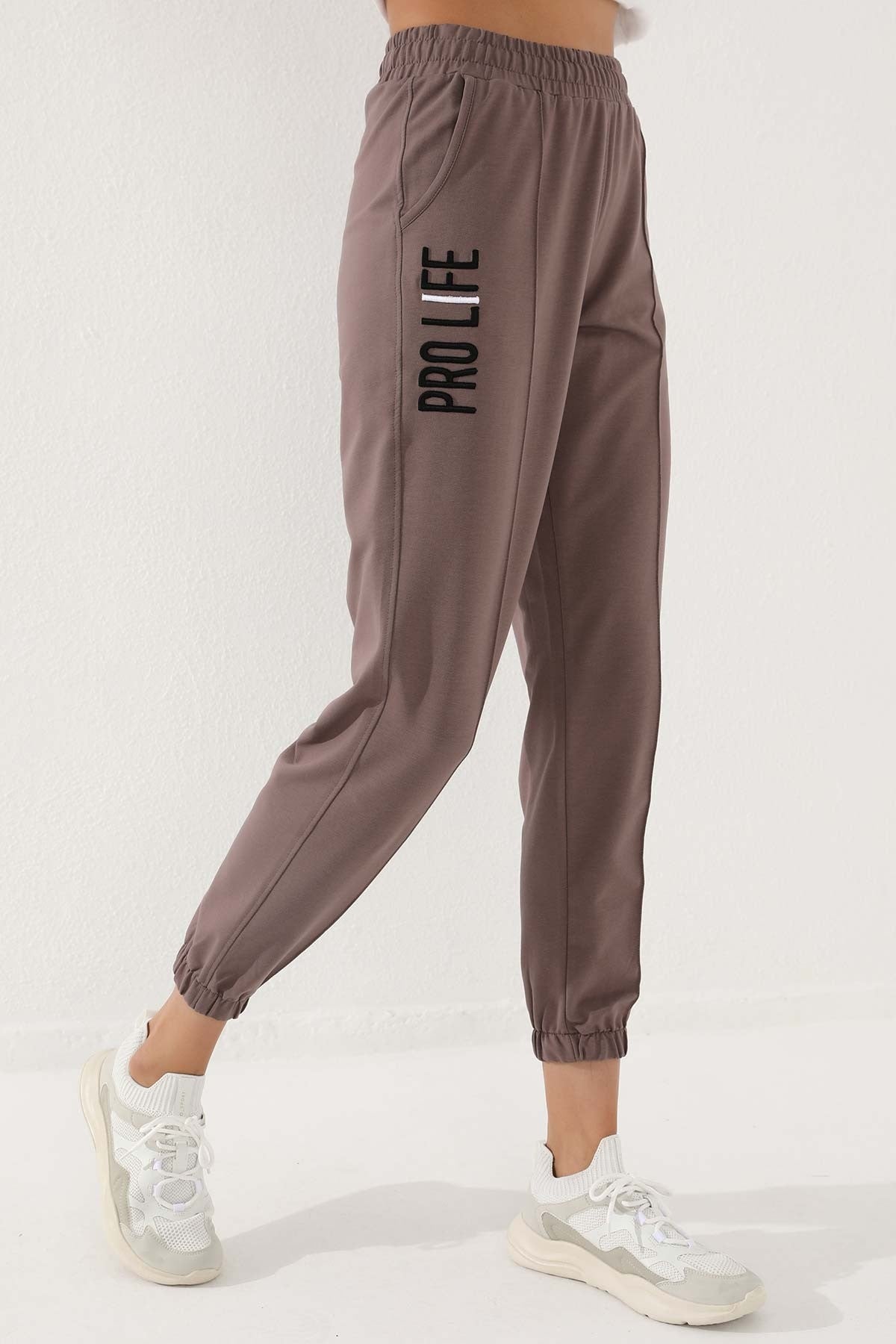 Women's Comfort Fit Elastic Cuff Embroidered Soil Writing Tracksuit Bottom - 94571
