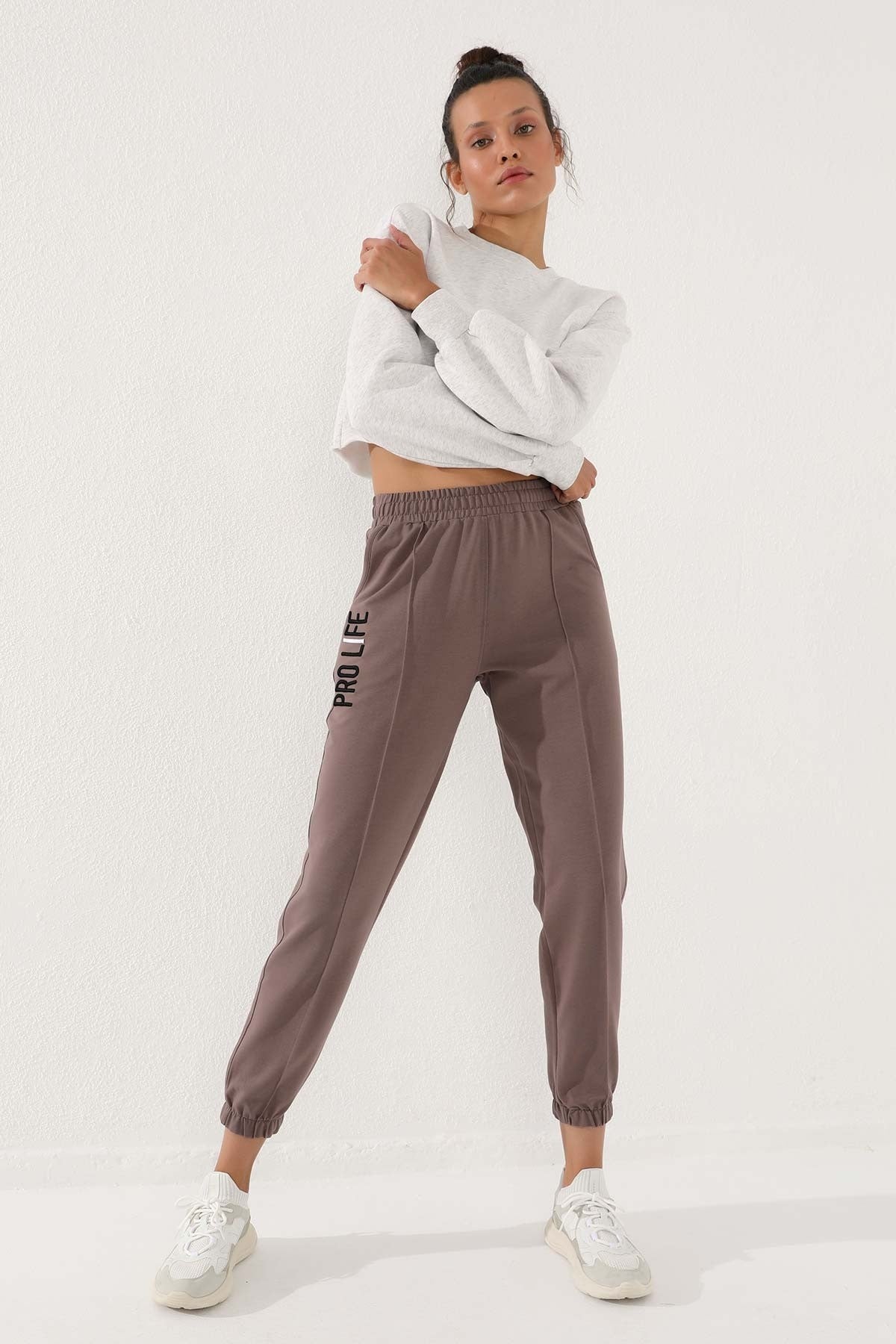 Women's Comfort Fit Elastic Cuff Embroidered Soil Writing Tracksuit Bottom - 94571