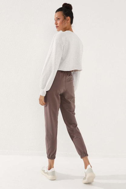 Women's Comfort Fit Elastic Cuff Embroidered Soil Writing Tracksuit Bottom - 94571