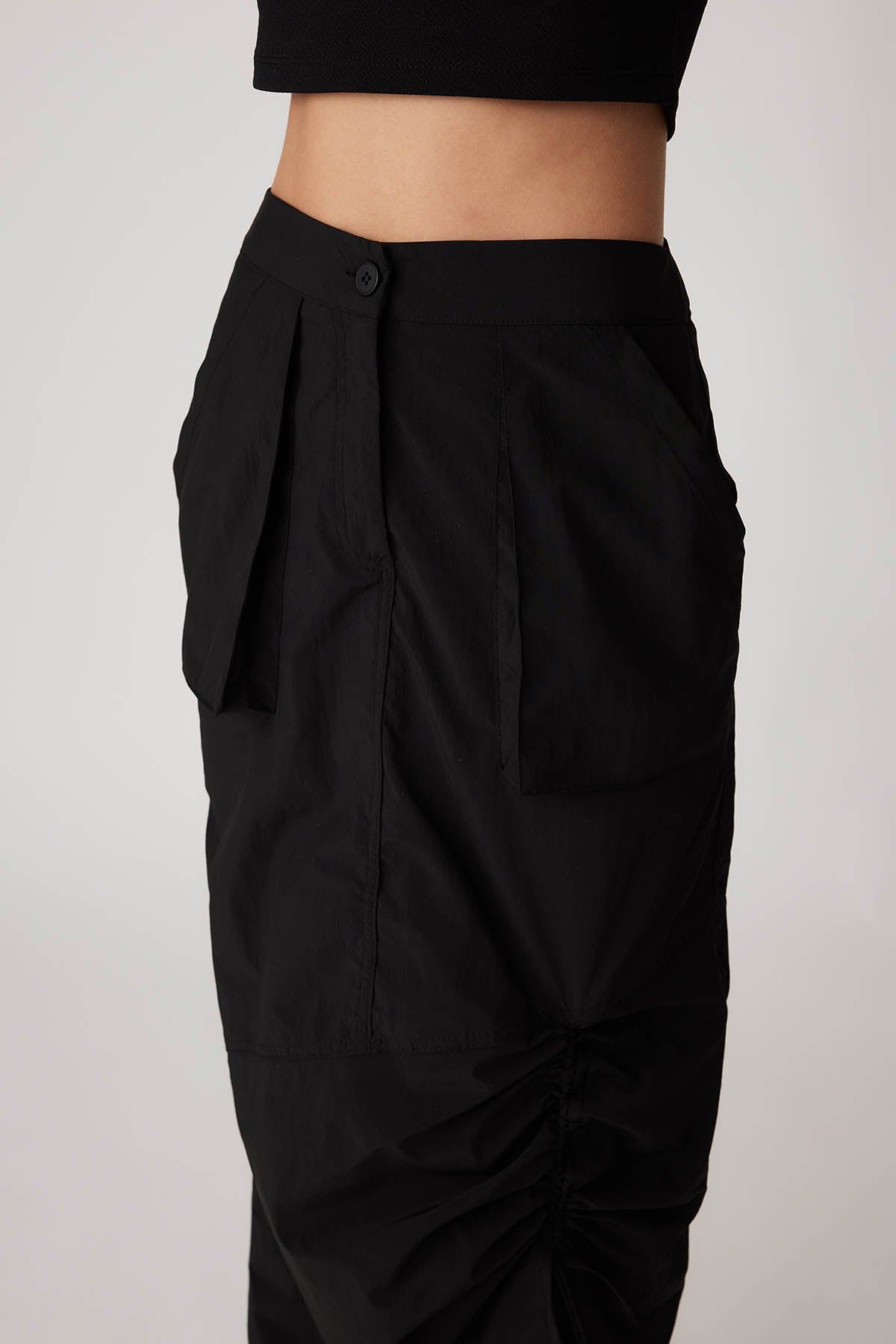 PARACHUTE FABRIC FRONT CURVED POCKET SKIRT