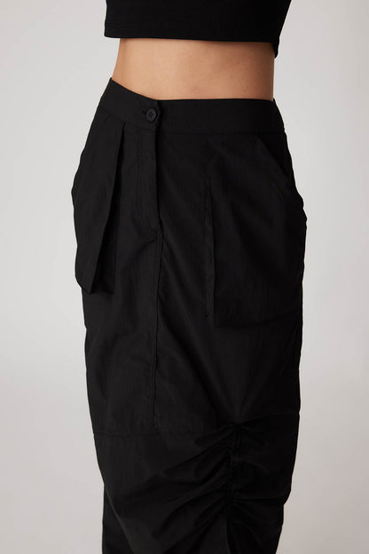 PARACHUTE FABRIC FRONT CURVED POCKET SKIRT