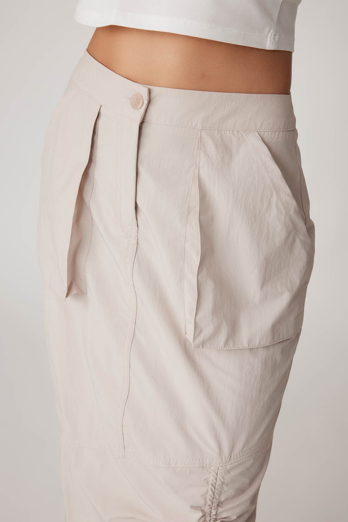 PARACHUTE FABRIC FRONT CURVED POCKET SKIRT