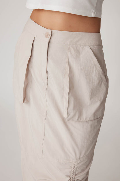 PARACHUTE FABRIC FRONT CURVED POCKET SKIRT