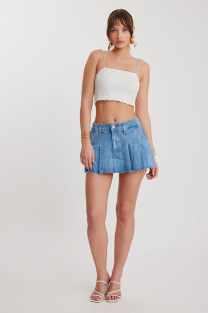 PLEATED DENIM MINI-SKIRT