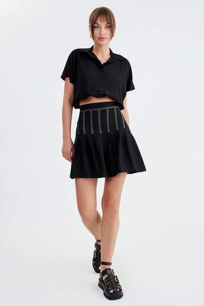 PLEATED MINI-SKIRT